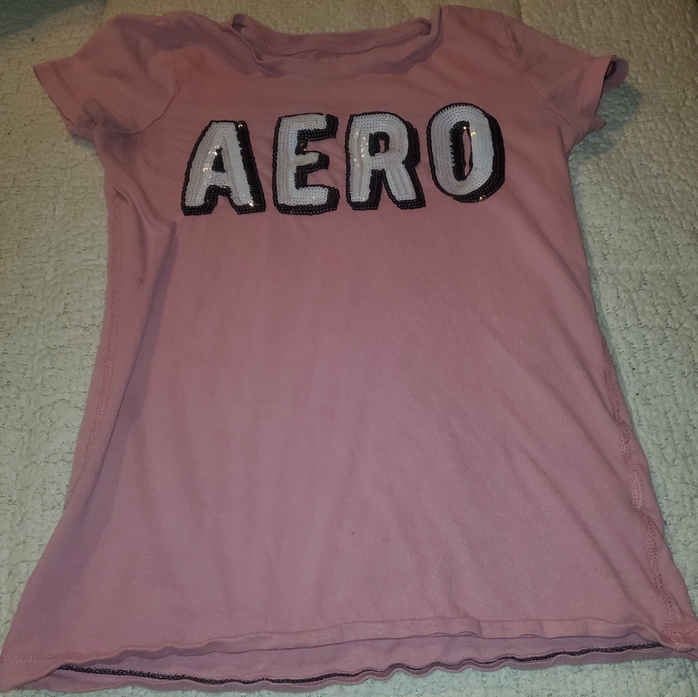 A nice Aeropostale sequined shirt, it does have a small hole in the back